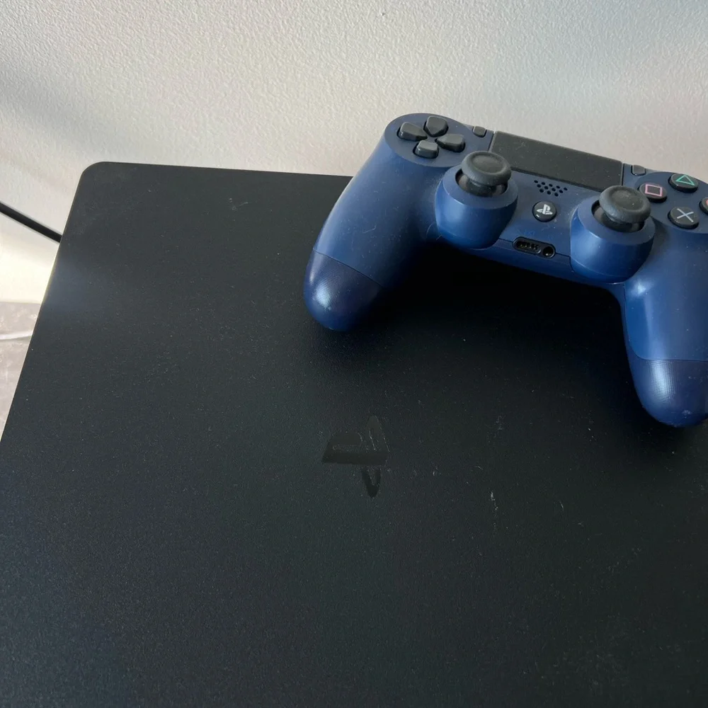 Sony PlayStation 4 Console with Game Collection - Black